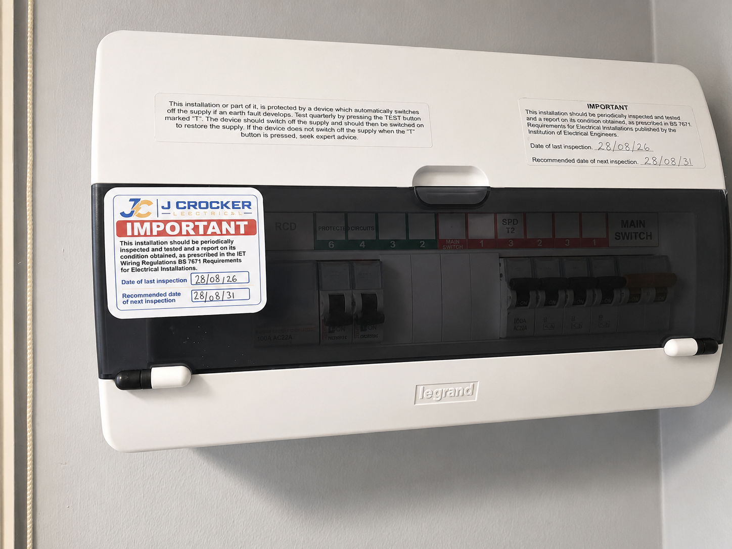 Electrician carrying out commercial electrical maintenance